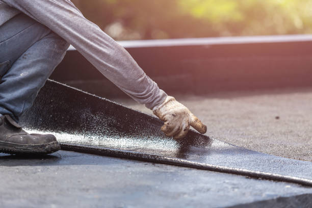 Professional Basement Waterproofing technician working in Lynnville, IN